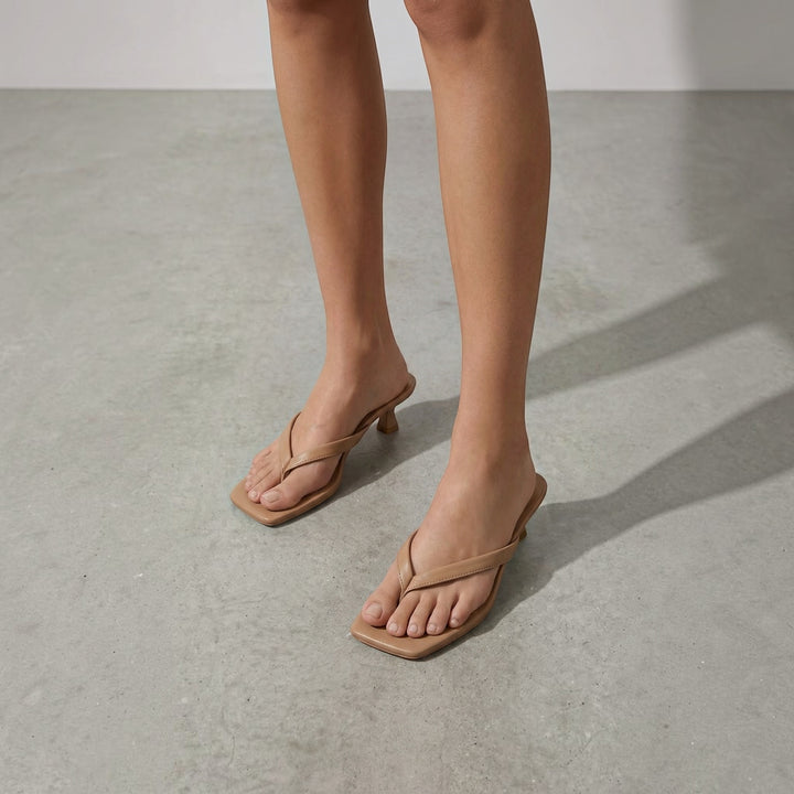 Luna Moda JESSICA beige thong-style kitten heel sandals with a square toe design worn on feet