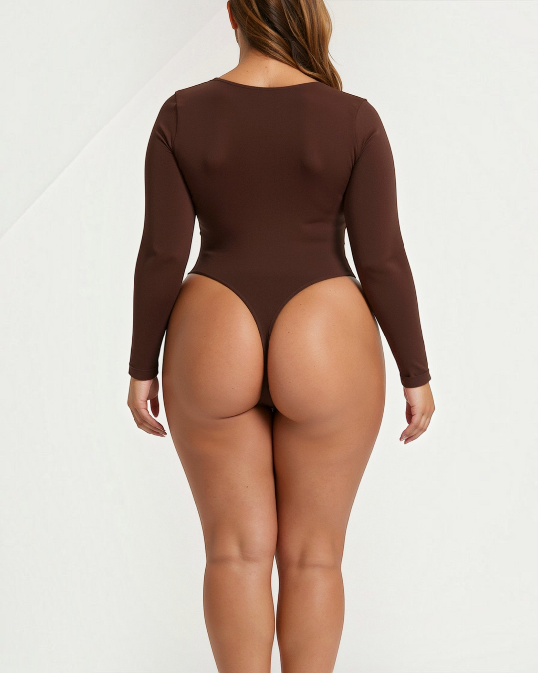 Luna Moda brown long sleeve thong bodysuit with seamless design worn by a woman, back view on white background