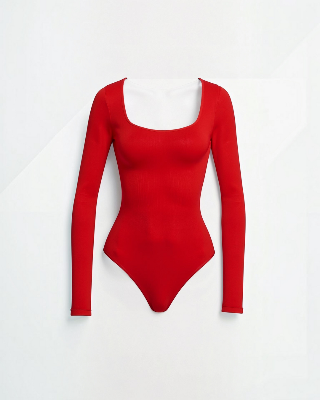 Luna Moda red long-sleeve thong bodysuit with a square neckline in seamless ultra-soft stretch fabric.