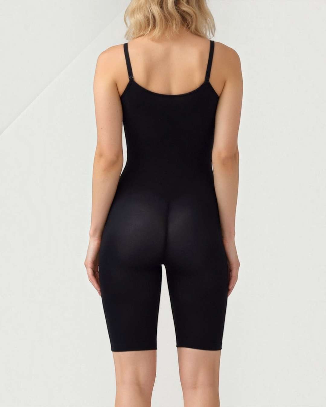 Luna Moda CLELIA black seamless mid-thigh shaping bodysuit with adjustable straps viewed from the back