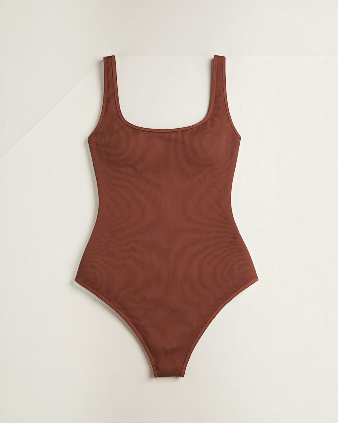 Luna Moda brown ribbed snatched bodysuit with a square neckline and thick straps for a sculpted hourglass fit.