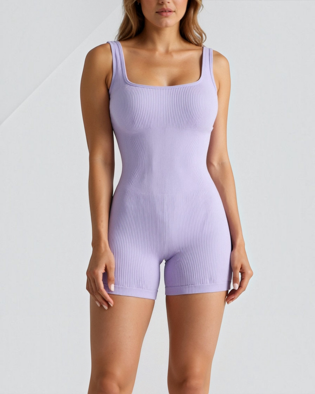 Luna Moda lavender ribbed square neck seamless romper with a sculpting fit worn by a model