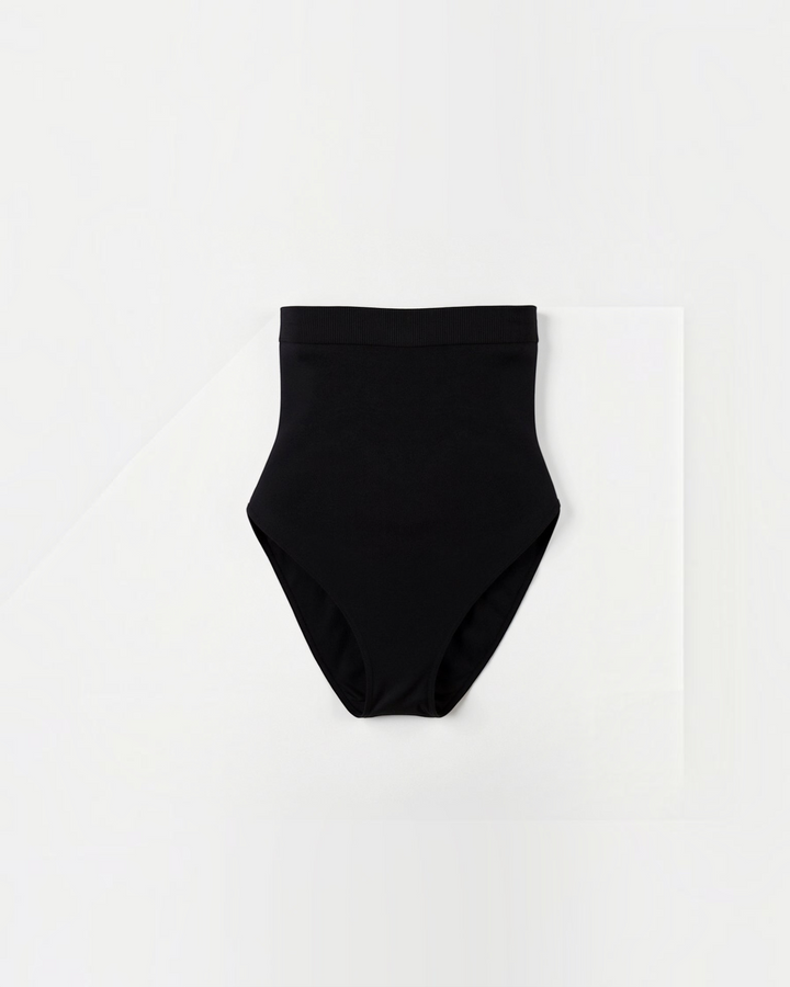 Luna Moda high-waisted black shaping briefs with seamless edges for a smooth silhouette under clothing.
