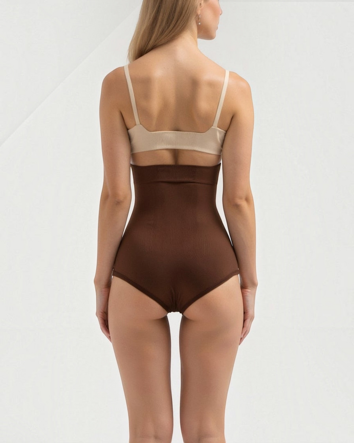 Luna Moda high-waisted brown shaping briefs with seamless edges worn by a model, back view.