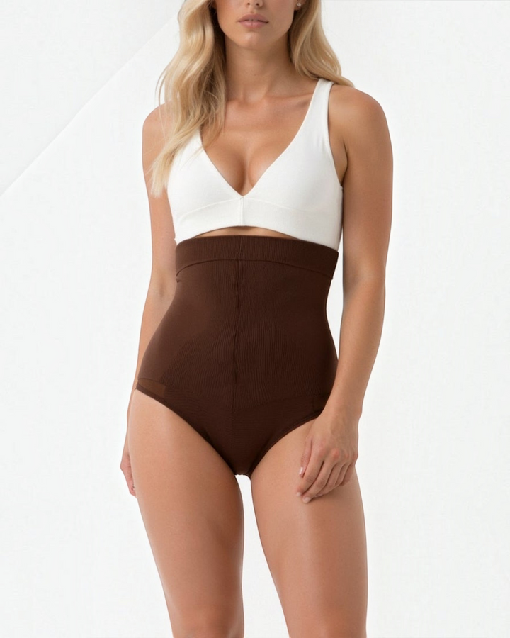 Luna Moda high-waisted brown shaping briefs with seamless edges worn by a model for a smooth silhouette