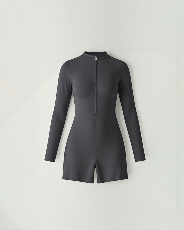 Luna Moda graphite seamless long-sleeve bodysuit with a high neck and quarter-zip front in compression fabric.