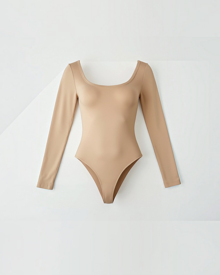 Luna Moda beige seamless long sleeve thong bodysuit with a scoop neckline and ultra-thin second-skin fabric.