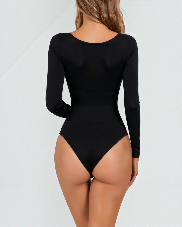 Luna Moda black long-sleeve thong bodysuit with seamless second-skin fit and back view on a model.