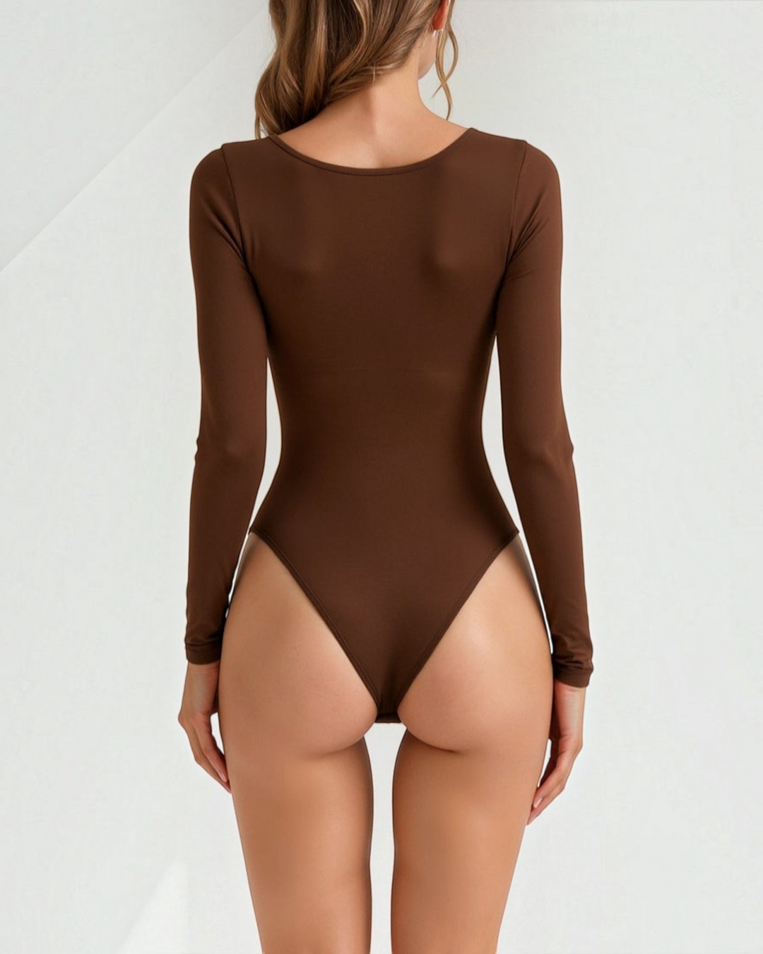 Luna Moda brown long sleeve thong bodysuit with seamless second-skin fit worn by a woman, back view