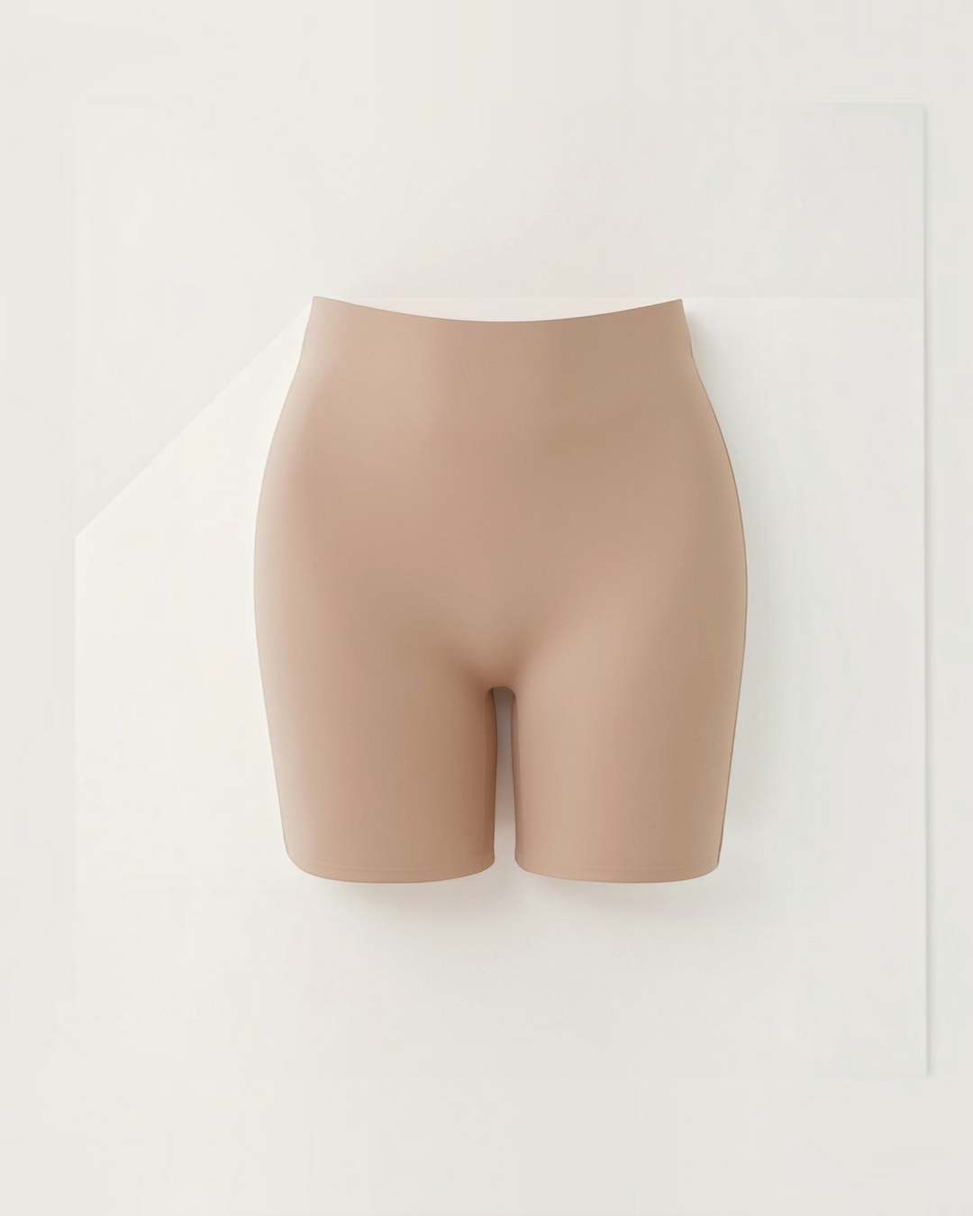 Luna Moda high-waisted seamless beige shaping shorts with mid-thigh length for a smooth silhouette under clothing.