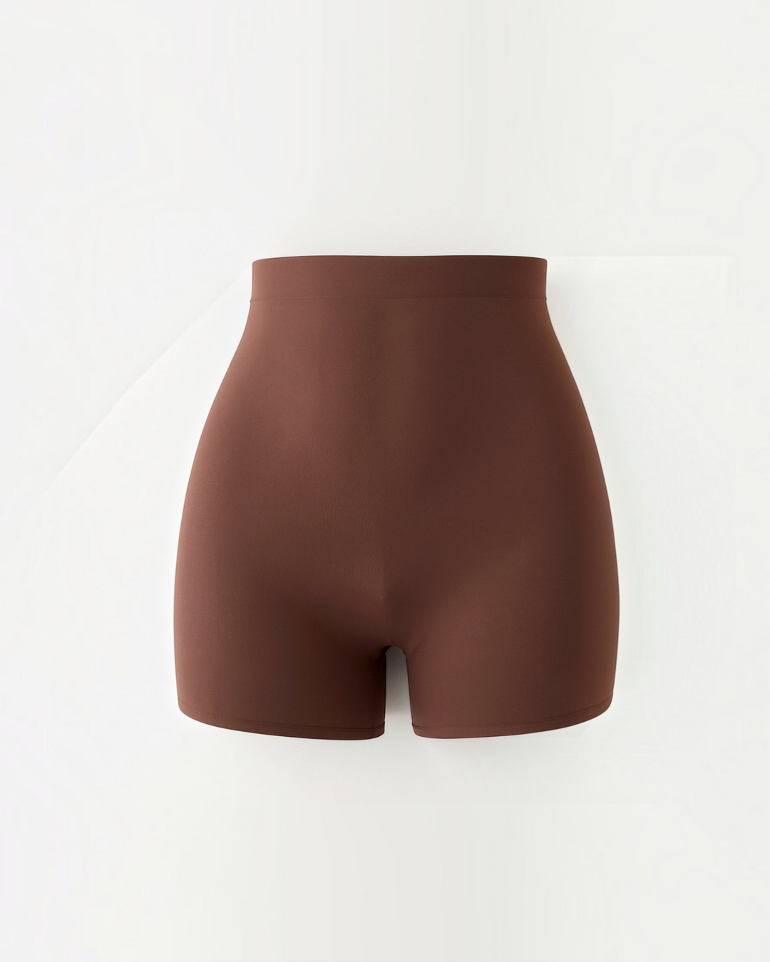 Luna Moda high-waisted seamless shaping shorts in dark brown, featuring a smoothing compressive fabric.