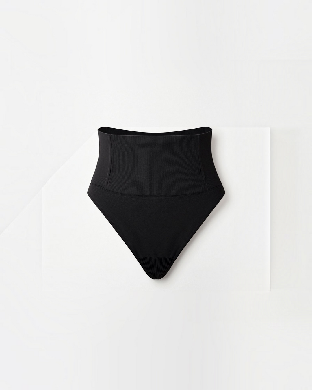 Luna Moda black mid-rise seamless shaping thong with ultra-thin compressive fabric for a smooth, invisible fit.