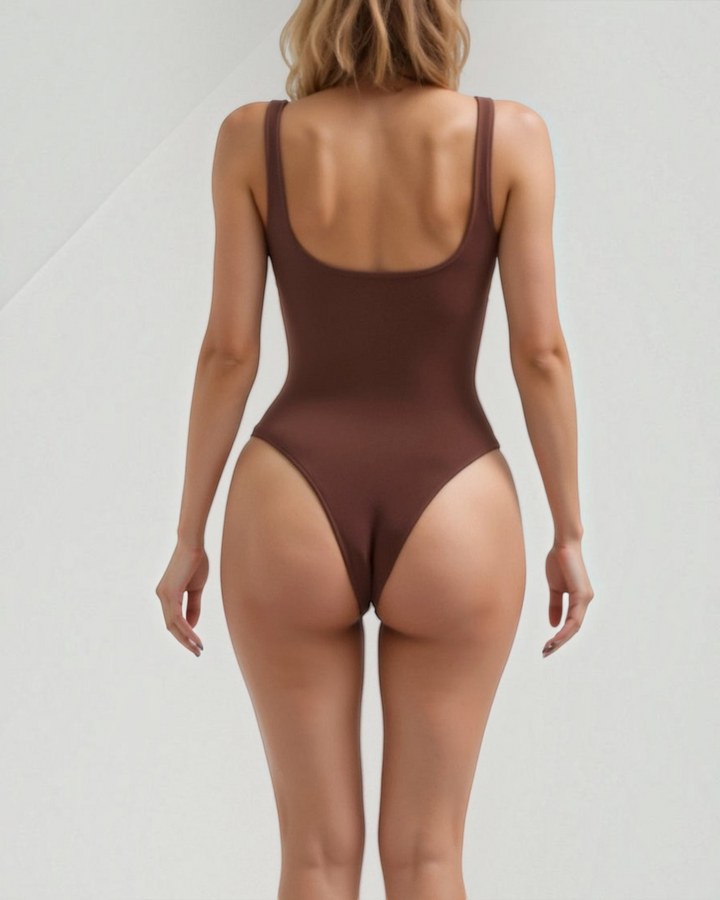 Luna Moda seamless brown bodysuit with a low-cut back and wide straps worn by a model, rear view.