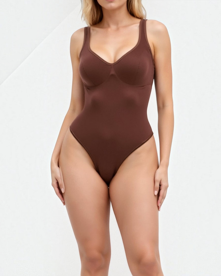 Luna Moda seamless brown bodysuit with a V-neckline, wide straps, and shaping compression fit on a model.