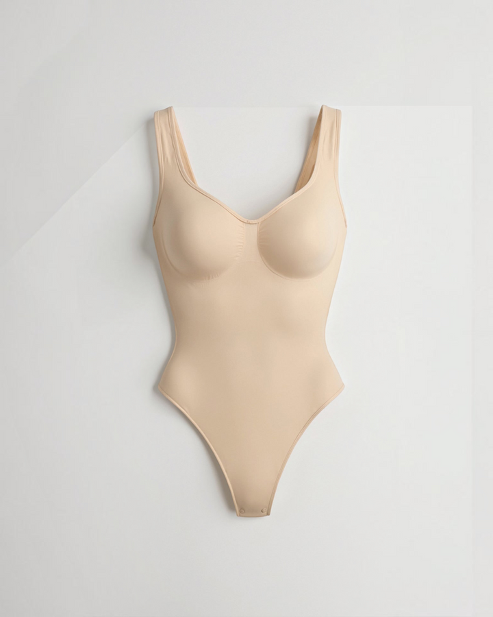 Luna Moda seamless nude bodysuit with a V-neckline, wide straps, and smoothing fabric for a sleek silhouette.
