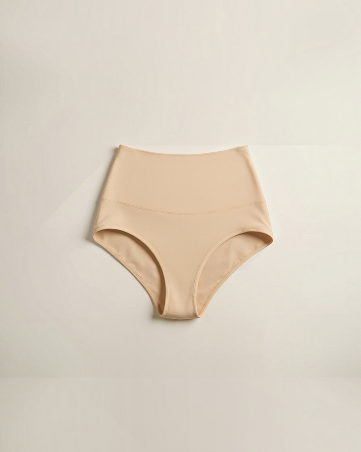 Luna Moda beige mid-rise seamless shaping briefs with ribbed texture for a smooth, invisible fit under clothing.