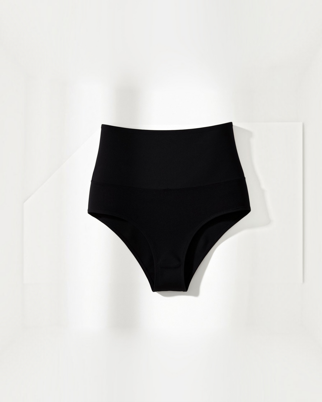 Luna Moda black mid-waist seamless shaping briefs with ribbed texture for a smooth and comfortable fit.