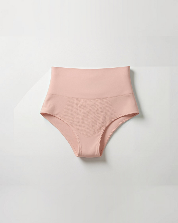 Luna Moda seamless mid-waist shaping briefs in soft pink with ribbed texture and smoothing compression fabric.