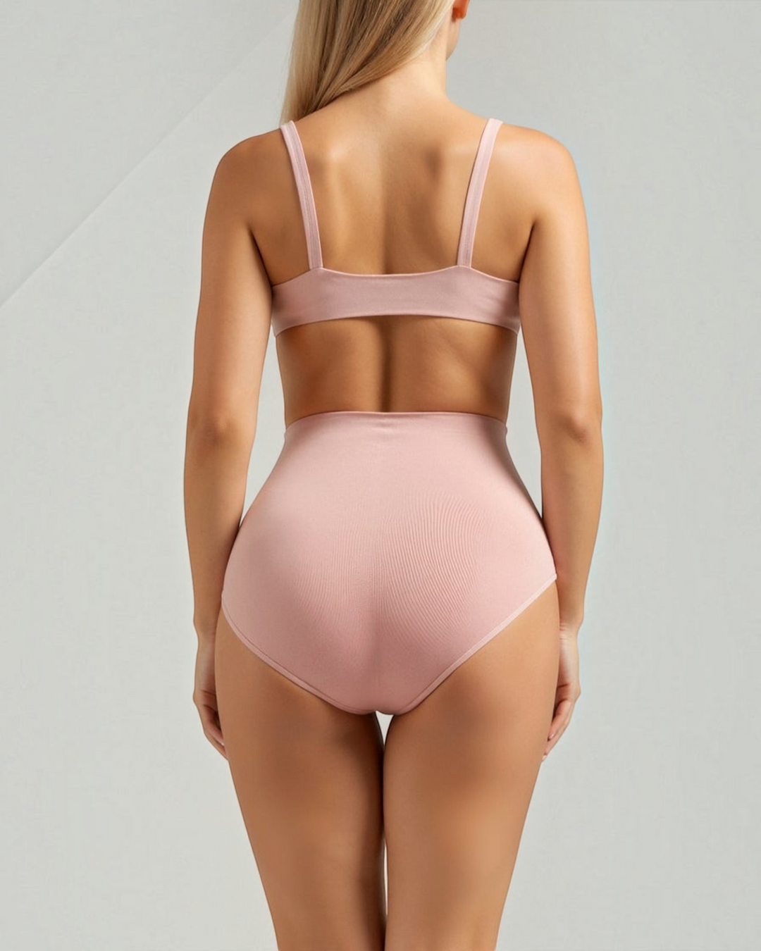 Luna Moda mid-rise seamless ribbed shaping briefs in soft pink, providing smooth support and an invisible fit.