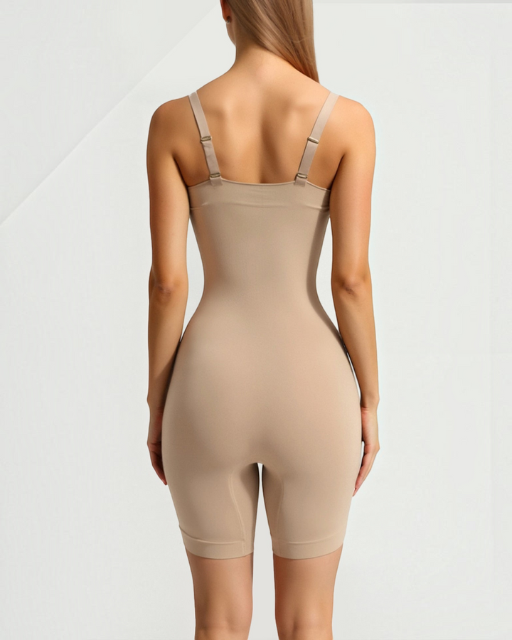 Luna Moda beige seamless shaping bodysuit with shorts, featuring a smooth silhouette and back view on a model.