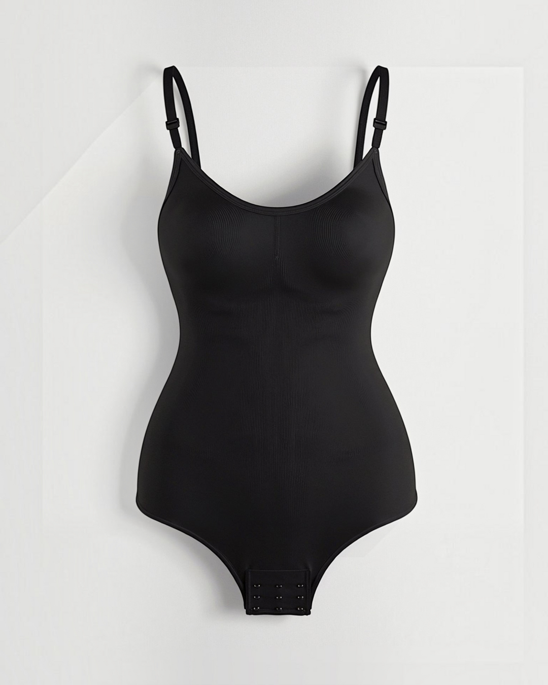 Luna Moda Daria black seamless shaping bodysuit with adjustable thin straps and snap closure for a smooth silhouette