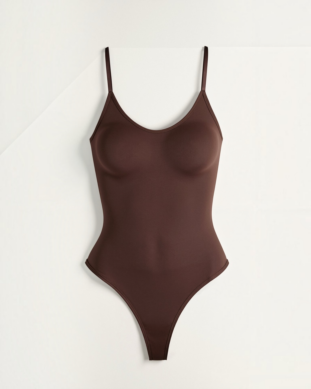 Luna Moda Snatched seamless brown thong bodysuit with adjustable straps and a flattering boat neckline