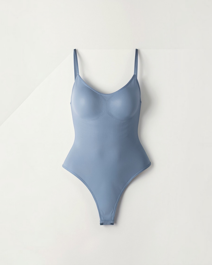Luna Moda Snatched blue thong bodysuit with a boat neckline, adjustable straps, and seamless compression fabric.