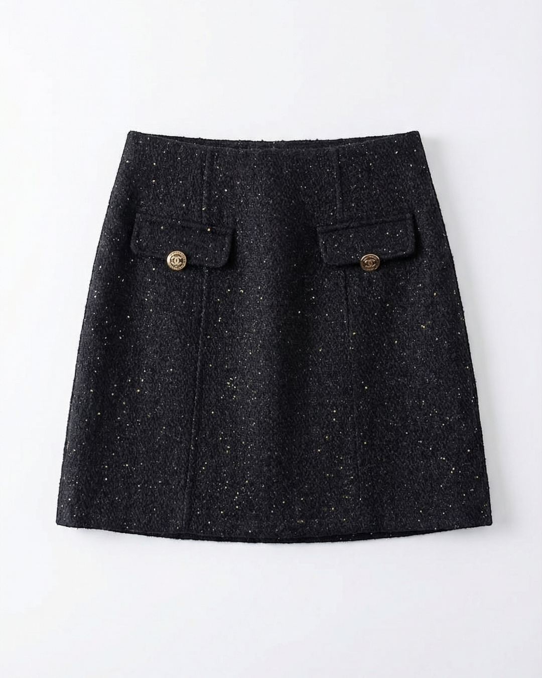 Luna Moda Tasha black textured mini skirt with gold button details and functional pockets in an A-line silhouette