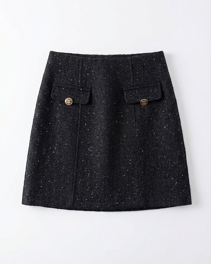 Luna Moda Tasha black textured mini skirt with gold button details and functional pockets in an A-line silhouette