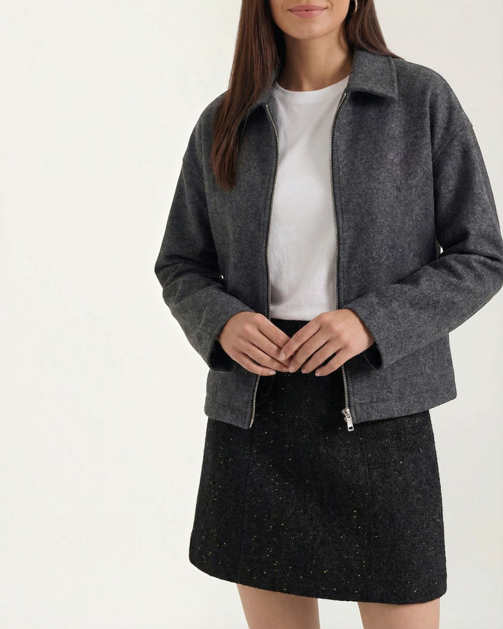Luna Moda Teresa charcoal grey zip-up jacket with a classic collar and relaxed fit worn over a white t-shirt.