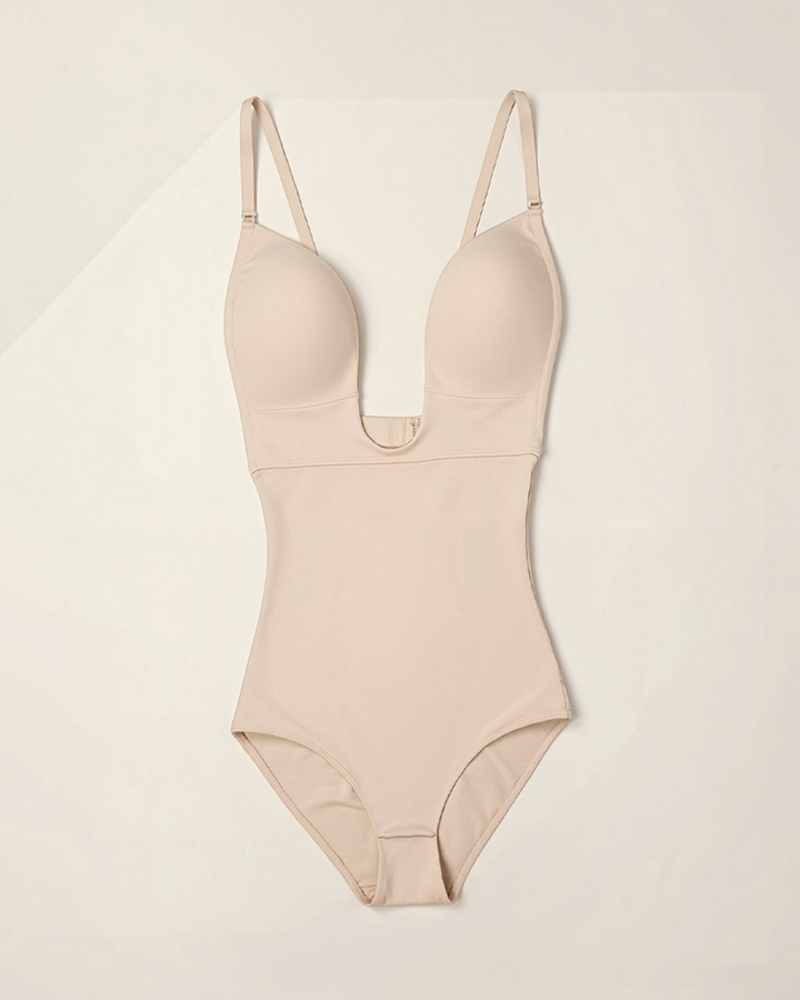 Luna Moda beige seamless thong bodysuit with underwire, deep neckline, and adjustable straps for a sculpted fit.