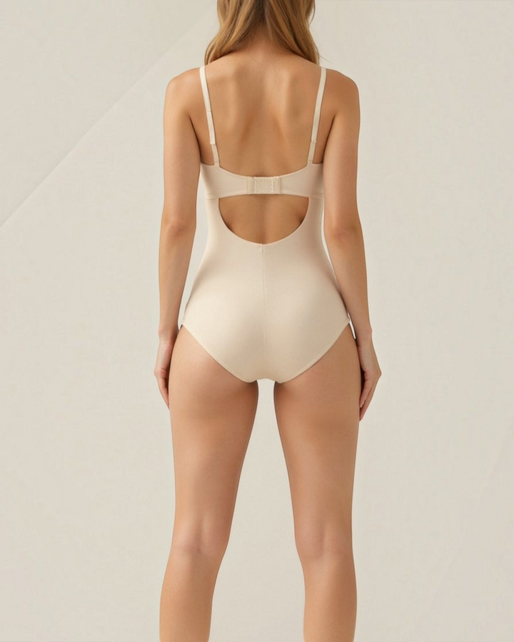 Luna Moda beige seamless thong shapewear bodysuit with adjustable straps and back hook closure, rear view
