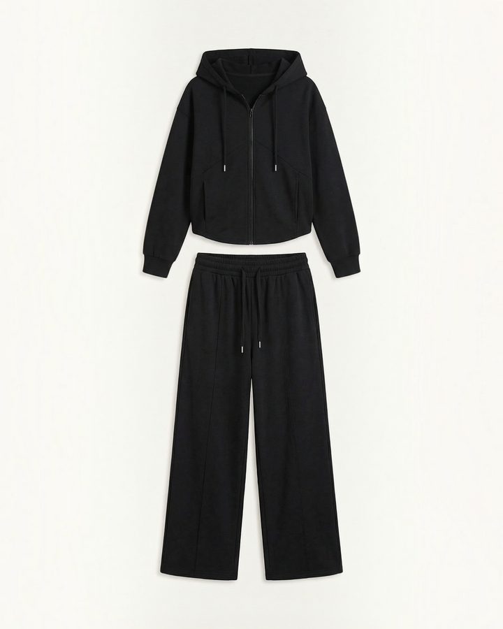 Luna Moda Yolanda black two-piece set featuring a zip-up hoodie and wide-leg lounge pants in soft fabric.