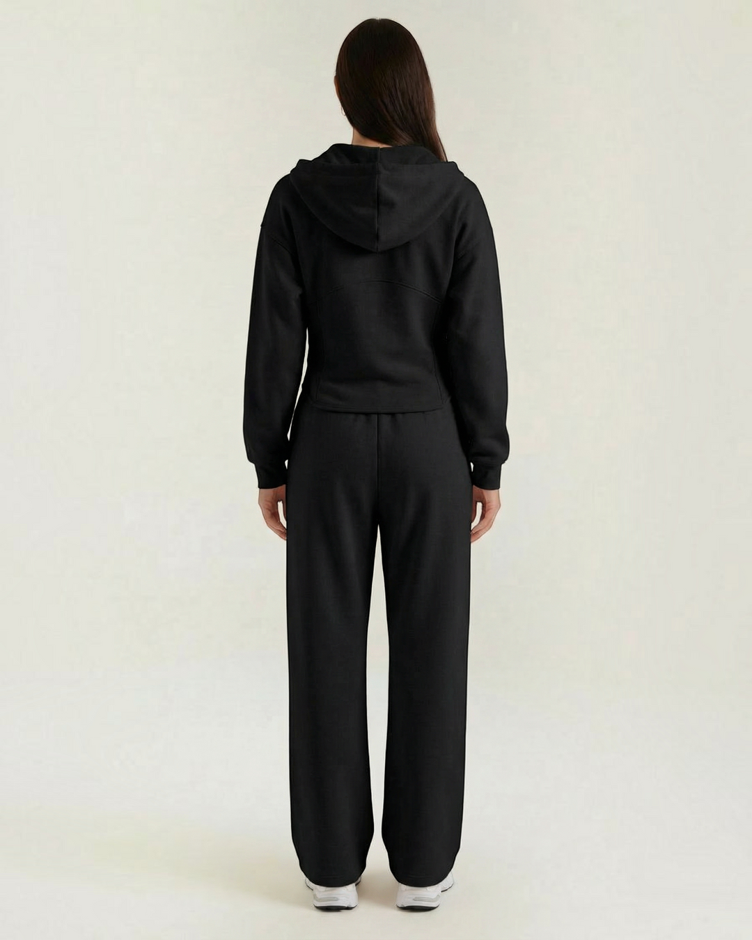 Luna Moda black two-piece set featuring a hooded sweatshirt and wide-leg trousers viewed from the back