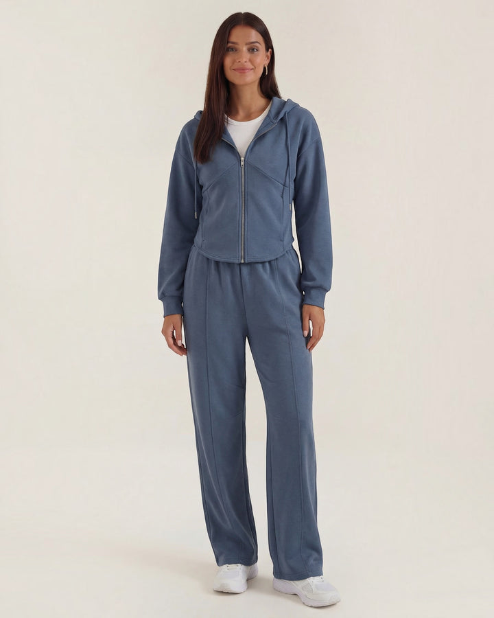 Luna Moda Yolanda blue two-piece lounge set with a zip-up hooded sweatshirt and wide-leg trousers on a model.