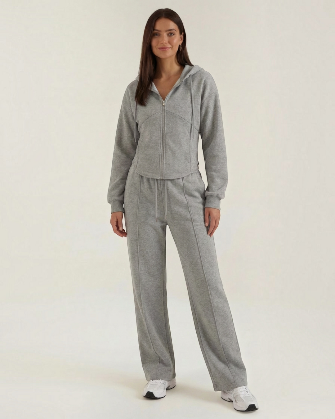 Luna Moda Yolanda grey two-piece set featuring a zip-up hoodie and wide-leg trousers worn by a model
