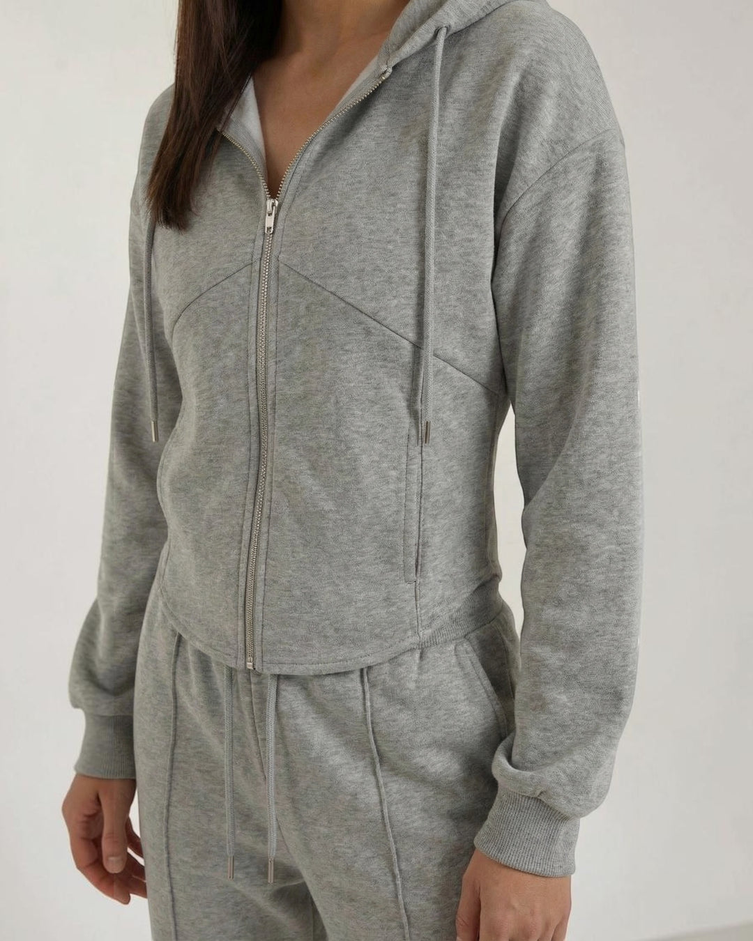 Luna Moda Yolanda grey two-piece set featuring a zip-up hoodie and matching wide-leg trousers in soft fabric