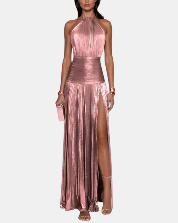 Luna Moda metallic peridot halter neck evening gown with open back and high leg slit worn by a model