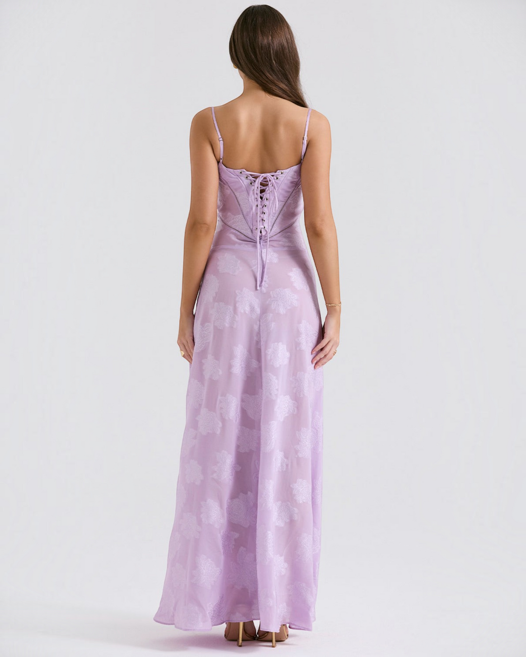 Luna Moda Seren evening dress in lavender with floral velvet overlay, spaghetti straps, and lace-up corset back detail