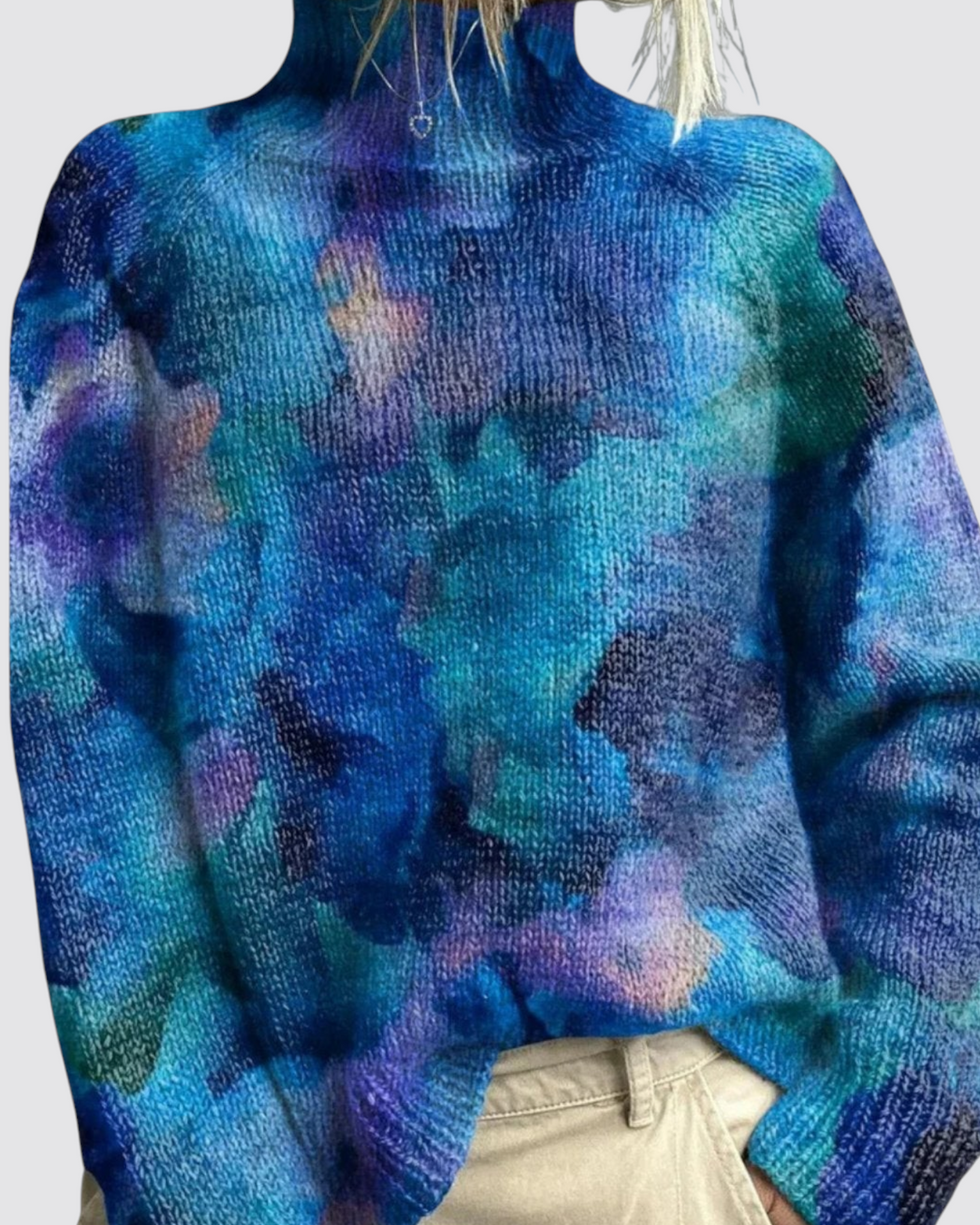 Luna Moda Lavinia turtleneck sweater featuring a vibrant blue and purple abstract floral print with a ribbed high neck.